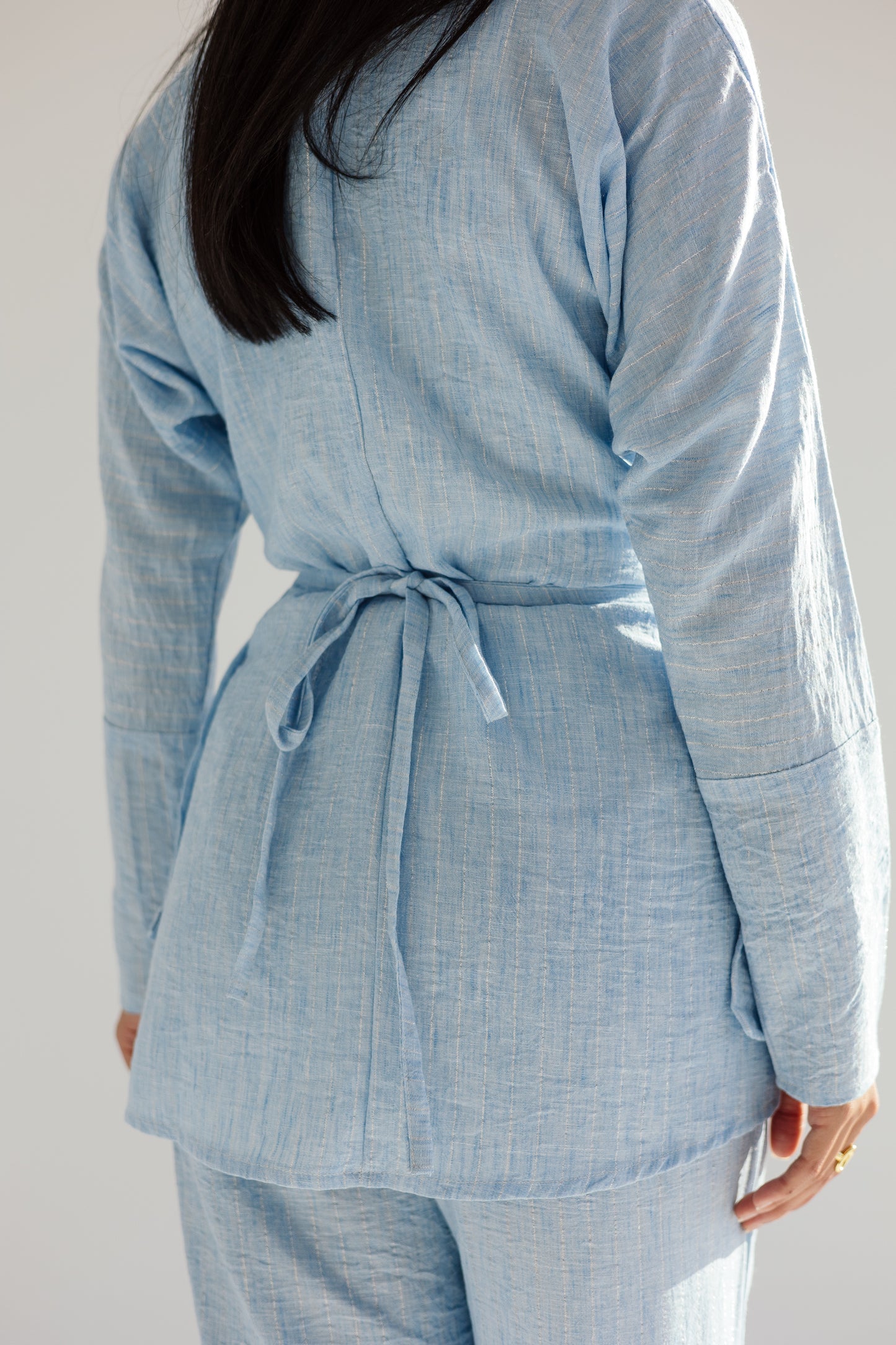 Shine lined wrap set in sky
