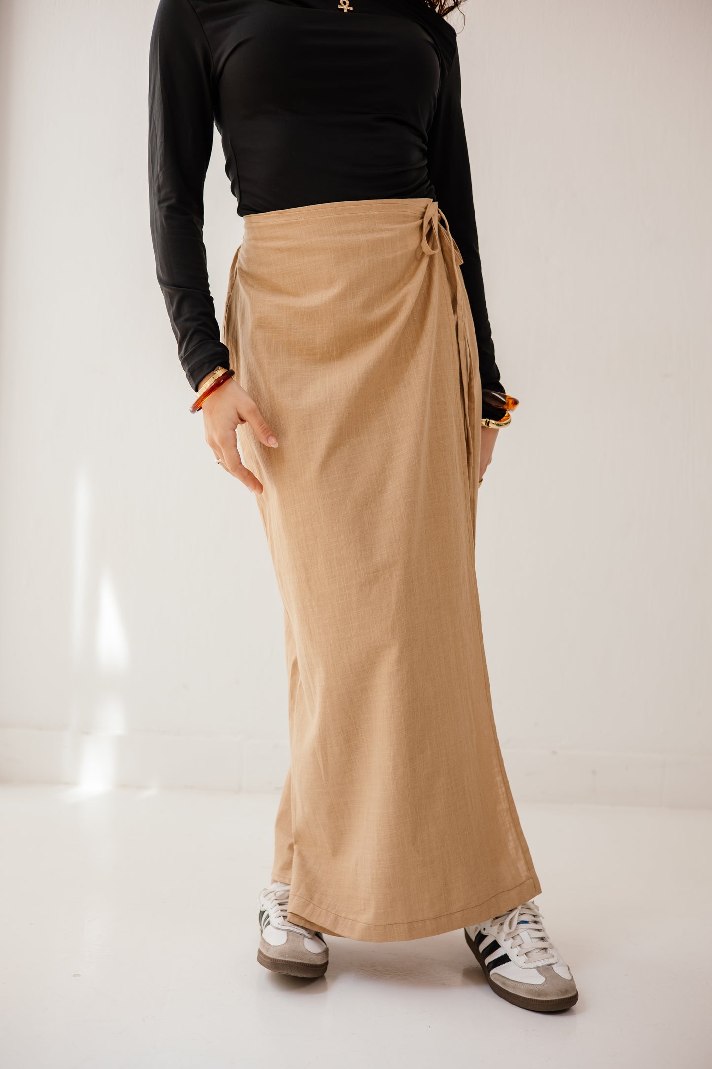 The wrap skirt in camel