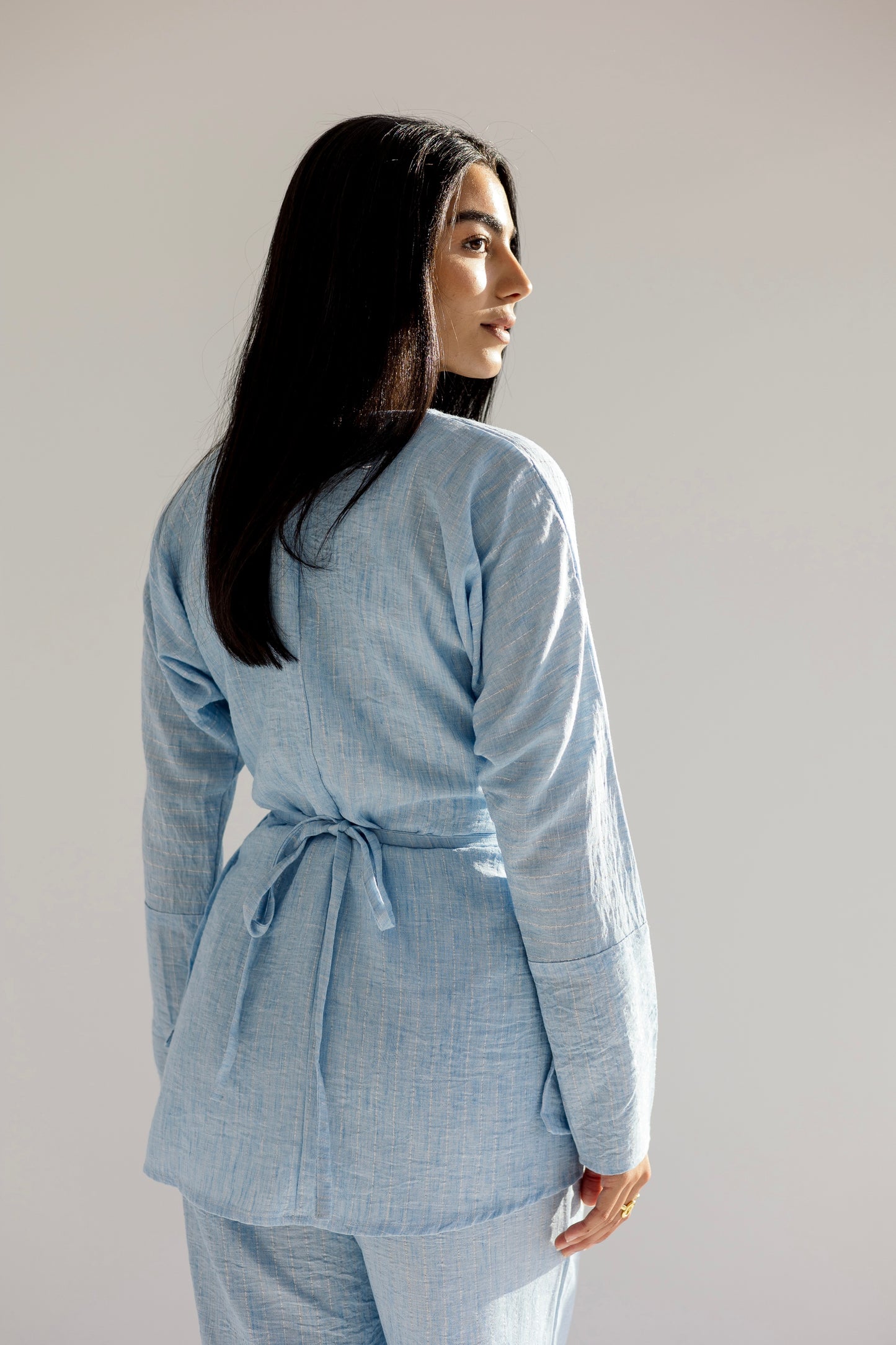 Shine lined wrap set in sky