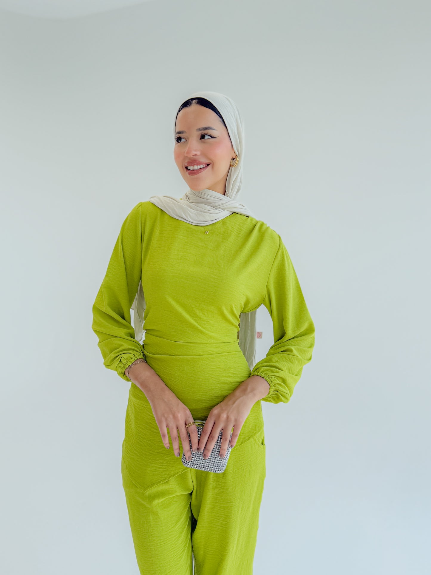 The signature set in Apple green