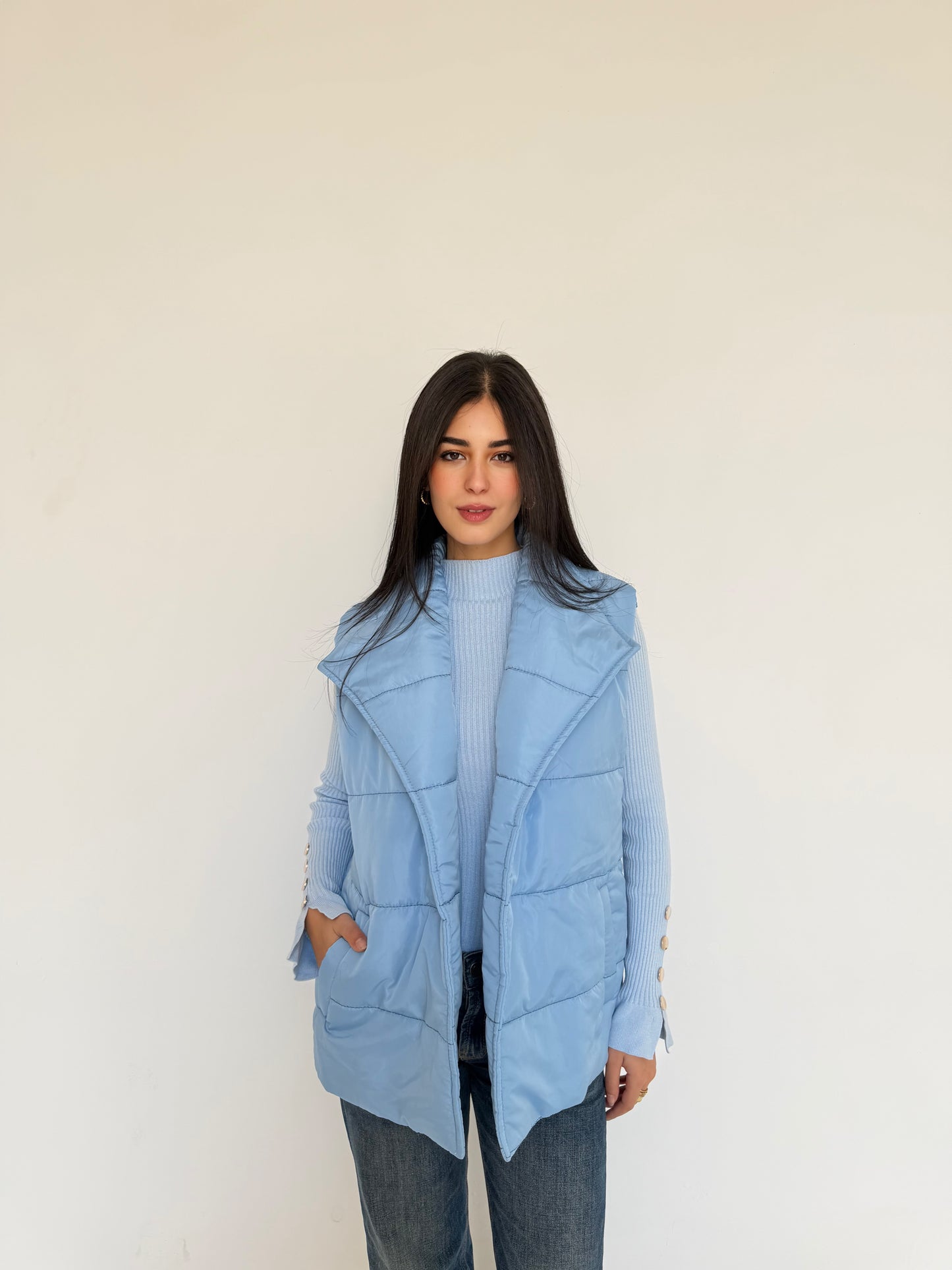 Puffer vest in sky