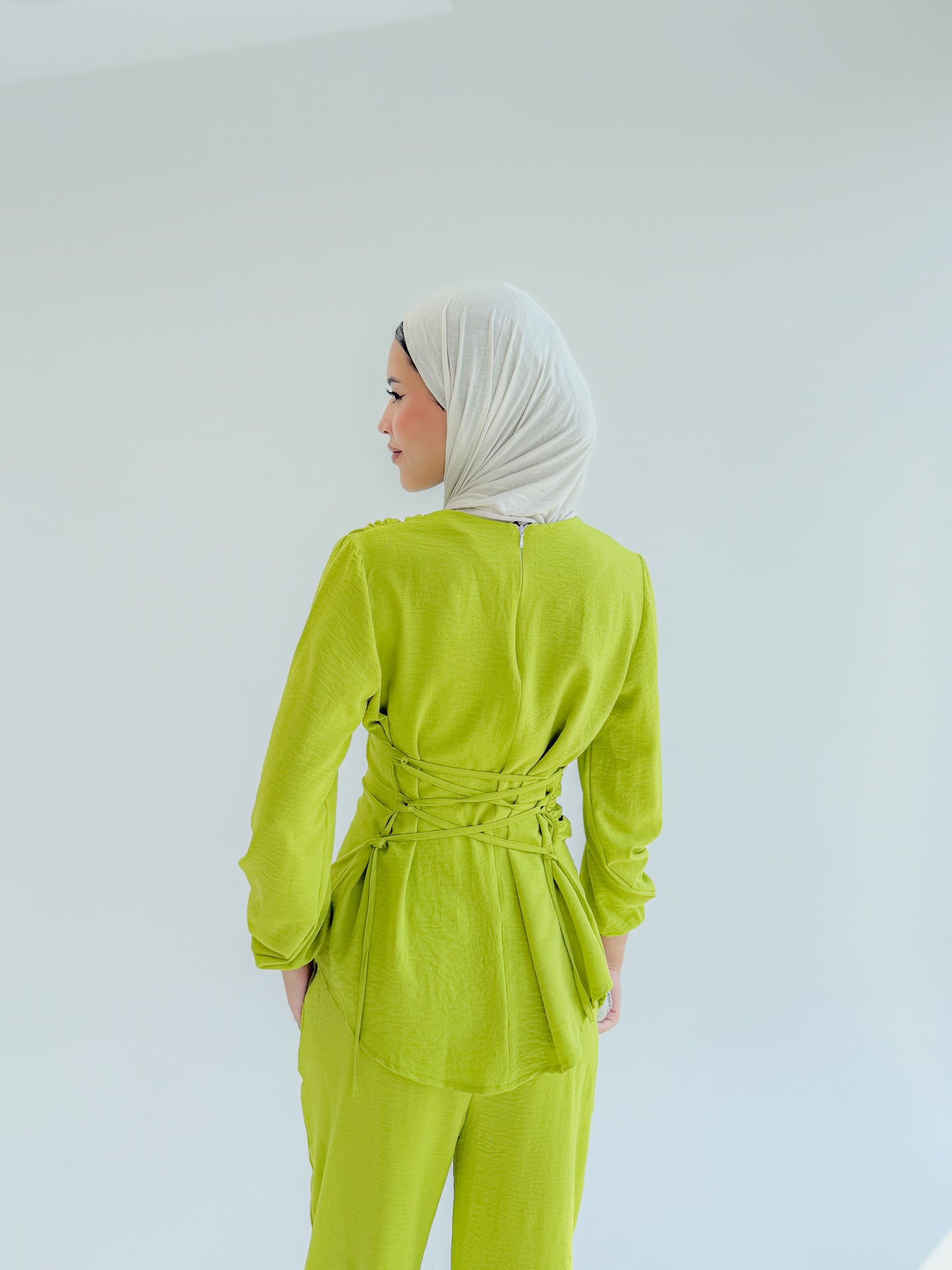 The signature set in Apple green