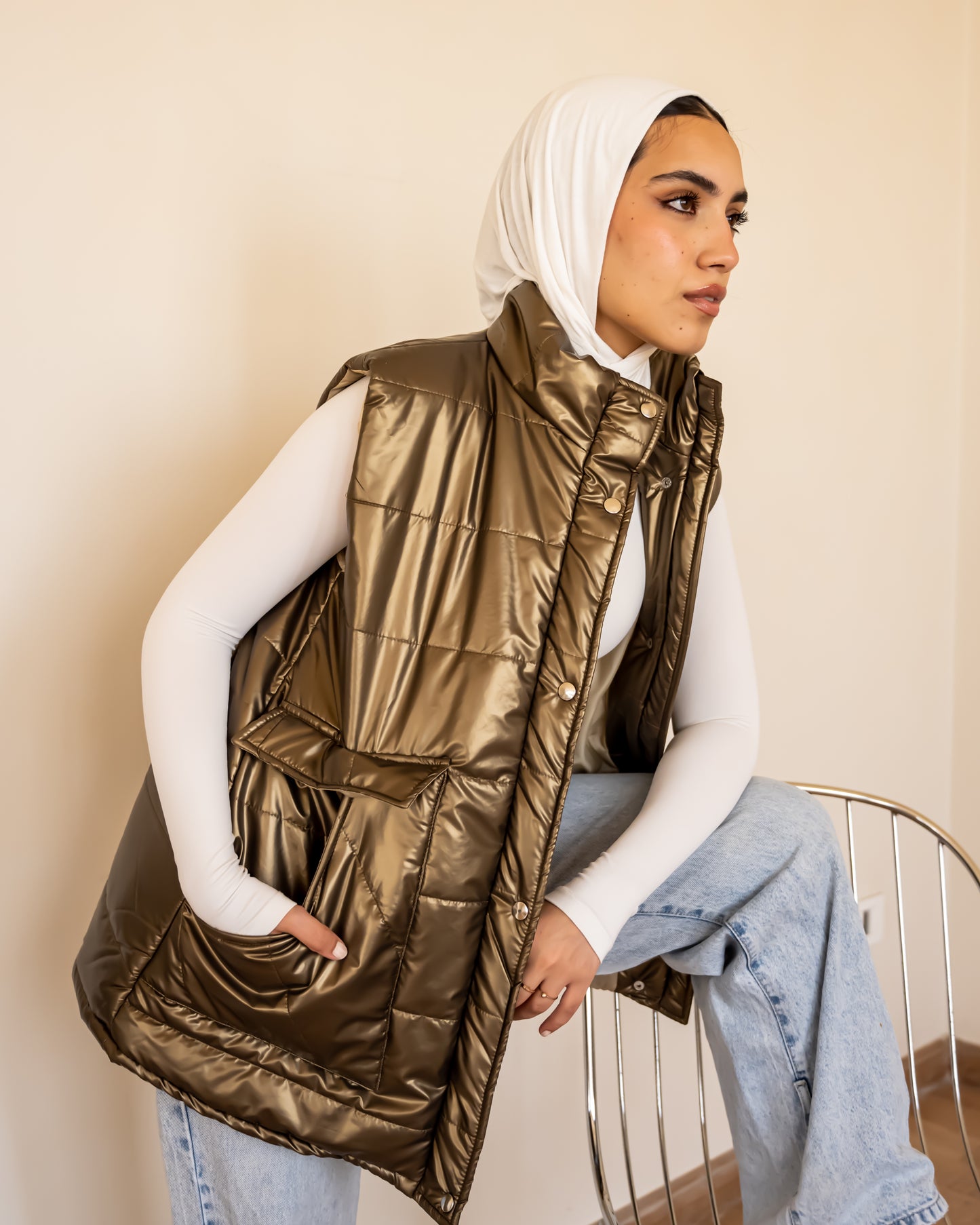 Metallic puffer vest in gold