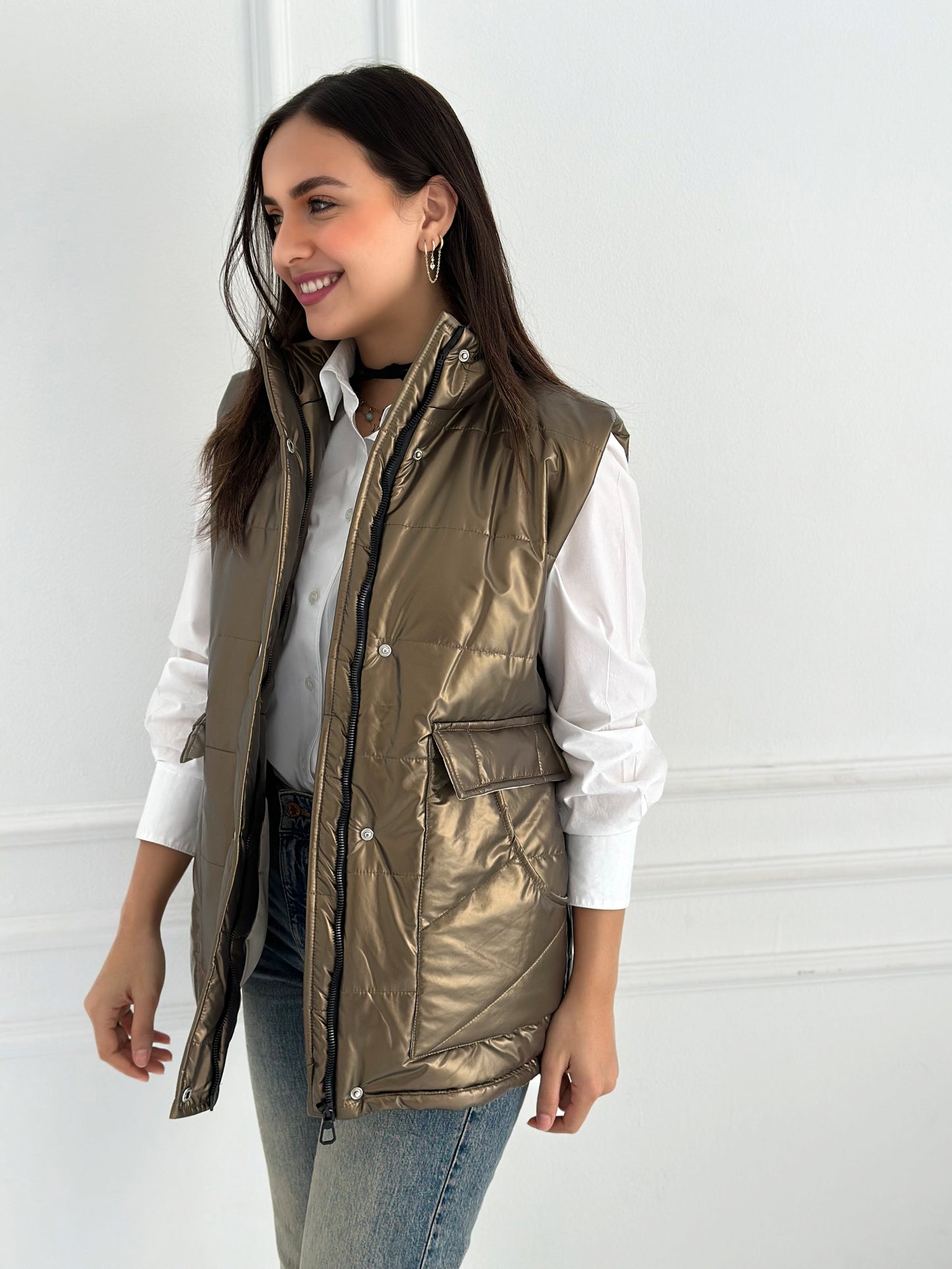 Metallic puffer vest in gold