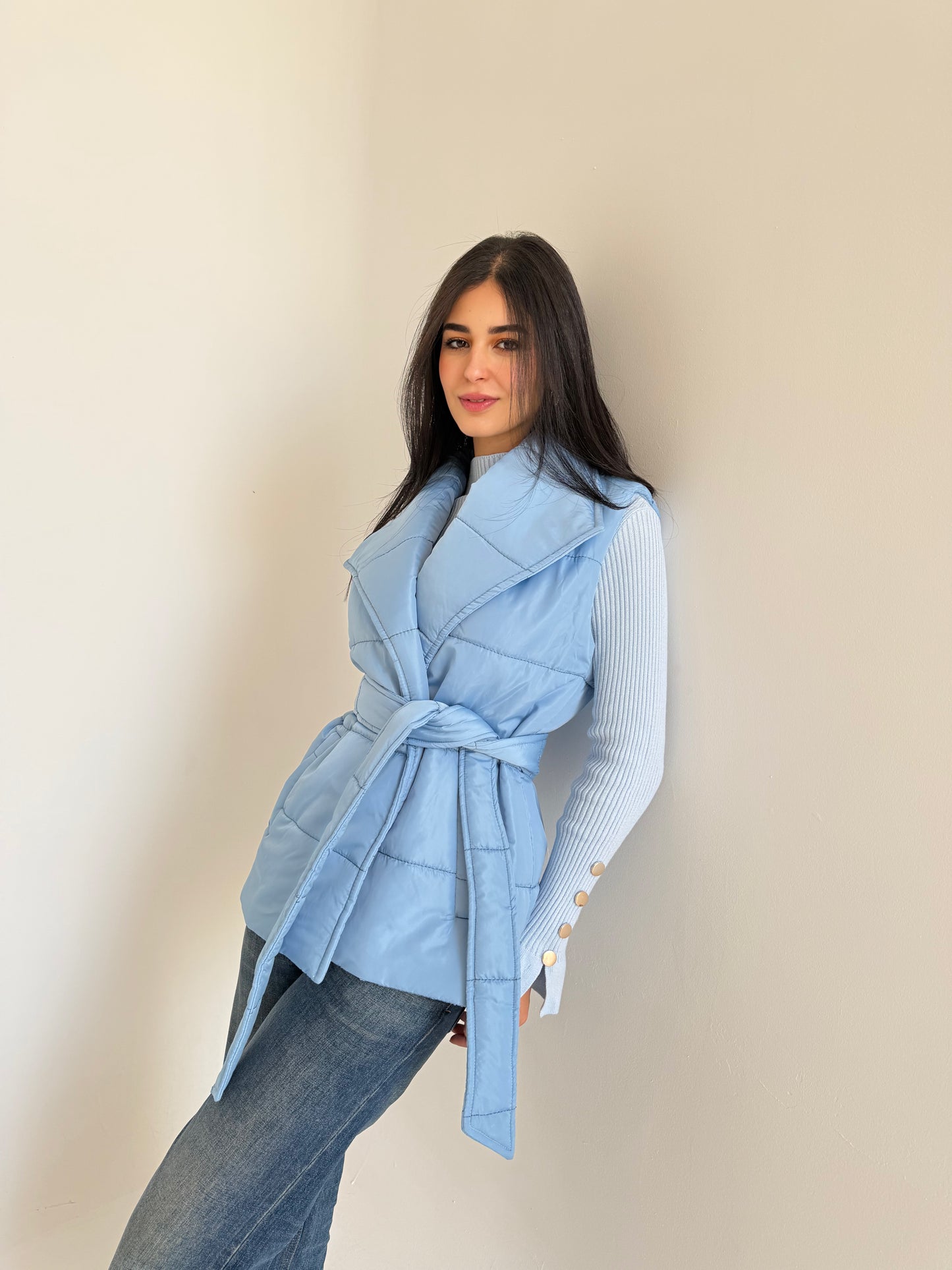 Puffer vest in sky