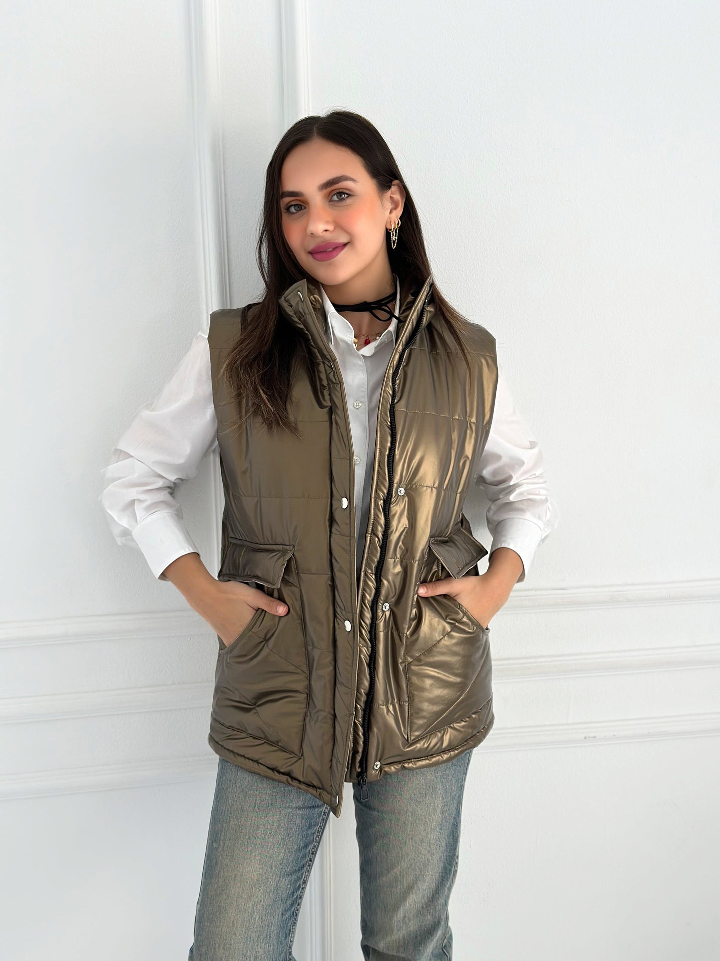 Metallic puffer vest in gold